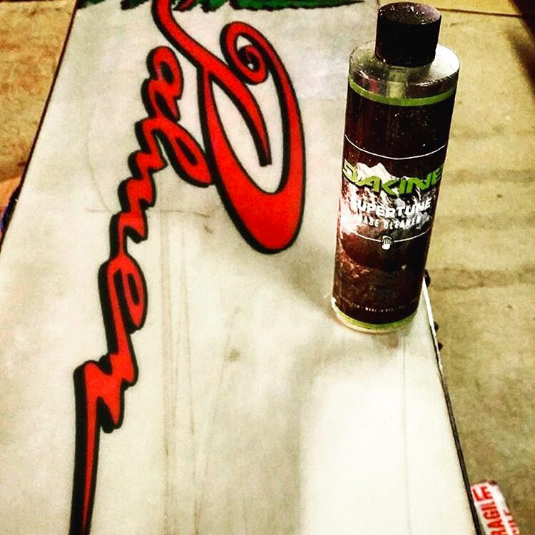 Snowboard Base Cleaning in the workshop